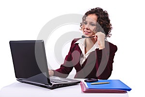 Woman with headset and laptop