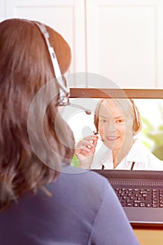 Woman headset video call doctor