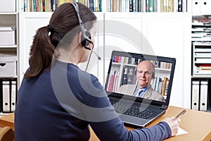 Woman headset video call professor