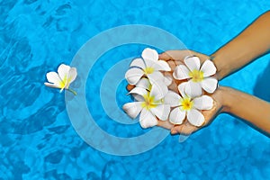 Woman Health. Summer. Spa Flowers Plumeria In Water. Wellness,