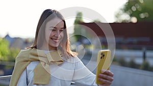 Woman with hearing loss using smartphone for video call