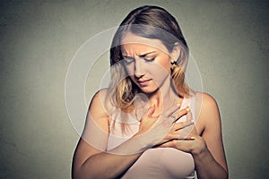 Woman with heart attack, pain, health problem photo