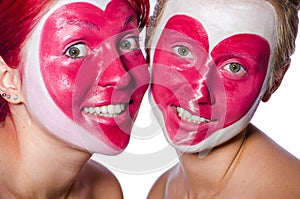 Woman with heart face painting isolated