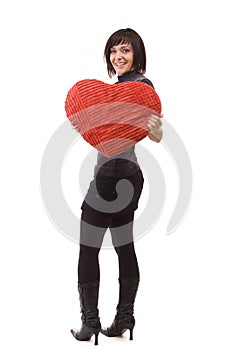 Woman with heart pillow