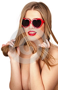 Woman with heart shaped sunglasses