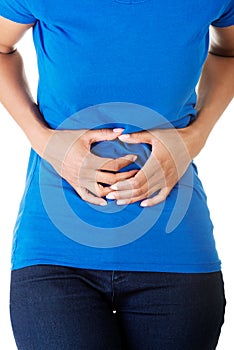 Woman heaving belly ache