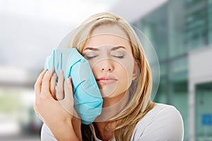 Woman heaving tooth ache