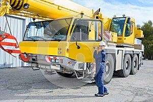 Woman with heavy equipment