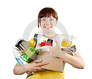 Woman with heavy-handed of household appliances