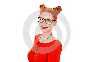 Woman in her 30s holding round eye glasses smiling