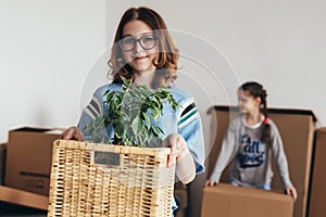 Woman and her daughters moving in new home