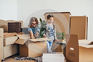 Woman and her daughters moving in new home
