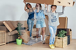 Woman and her daughters moving in new home