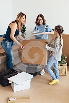 Woman and her daughters moving in new home