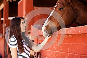 Woman during her equine therapy