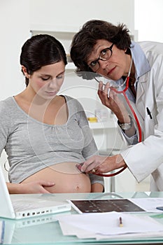 Woman at her gynaecologist. photo