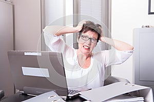 Woman in her homeoffice has stressy moment