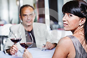 Woman and her husband in a restaurant