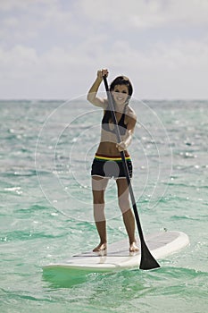Woman with her paddle board