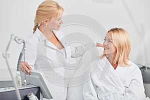 Woman and her personal doctor discussing the procedure