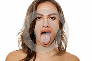 Woman with her tongue out photo