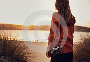 Woman with her vintage camera