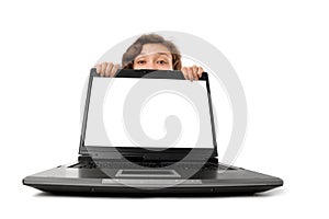Woman Hiding Behind a Laptop