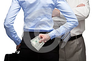 Woman hiding money and man in the background