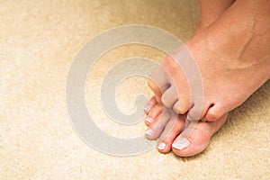 Woman hiding toes photo