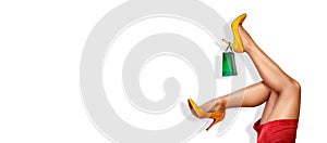 woman in high heels with shopping bag, holyday shopping season