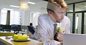 Woman with hijab meeting business man in startup office, healthy lifestyle in office, eating apple and fruits at office