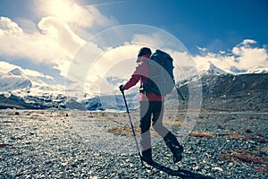 Woman hiker with camera