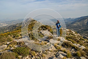 Woman hiker on the Cavall Verd, beautiful mountain landscape