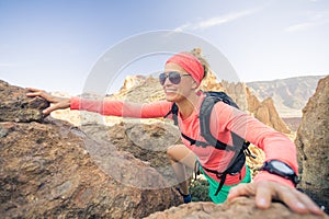 Woman hiker climbing mountains, weekend adventures