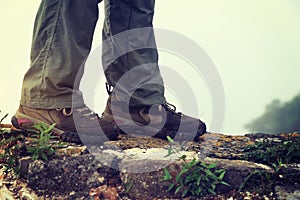 Woman hiker enjoy the view on the top of great wall