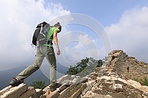 woman hiker enjoy the view on the top of great wall