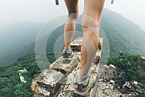 Woman hiker enjoy the view on the top of great wall