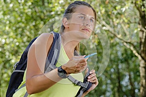 Woman hiker on green mountain