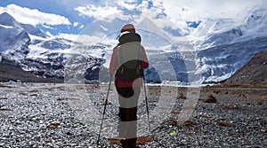 Woman hiker hiking in winter