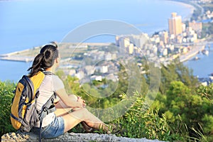 Woman hiker mountain peak