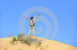 Woman hiker mountain top