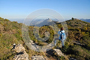 Woman hiker in the mountains, Spain photo