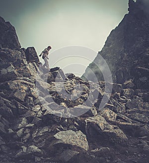 Woman hiker in a mountains