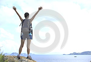 Woman hiker seaside