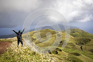 Woman hiking in the central highlands on São Jorge island, Azores