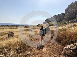 Woman hiking in Cyprus in Cape Greko photo