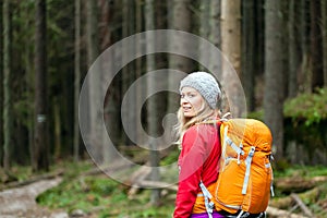 Woman hiking in forest