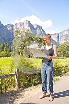 Woman hiking on forest trail