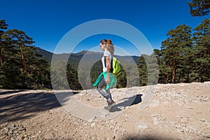 Woman hiking in Guadarrama mountain photo