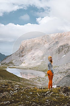 Woman hiking outdoor adventure travel in mountains alone active vacations trip female tourist